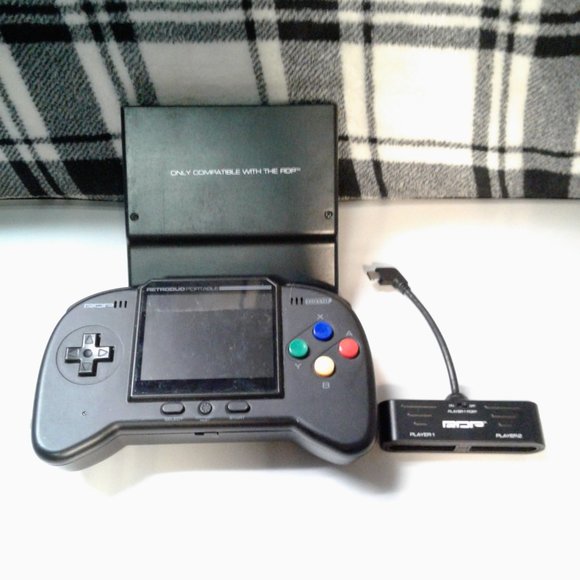 love old school nintendo well this handheld console lets you play old school NES - Picture 1 of 7